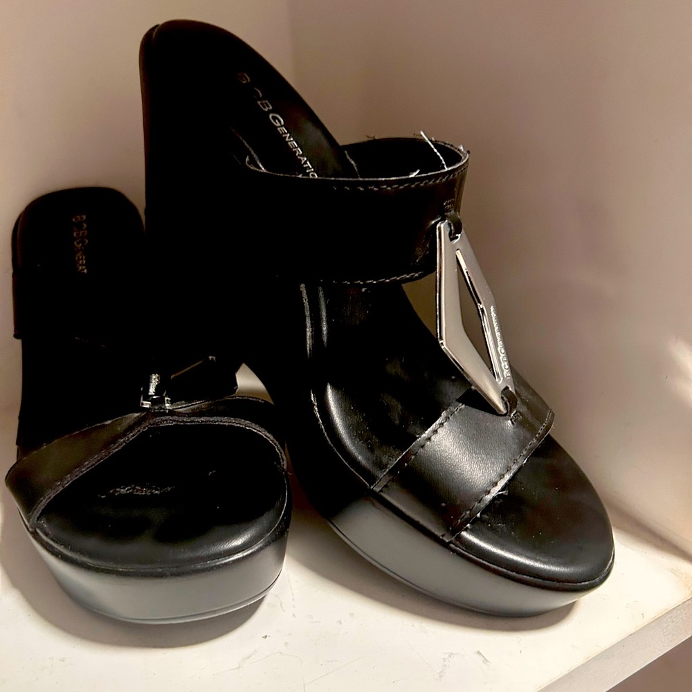 BCBG Black wedge with silver top.